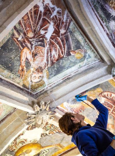 Artist restores painted ceiling